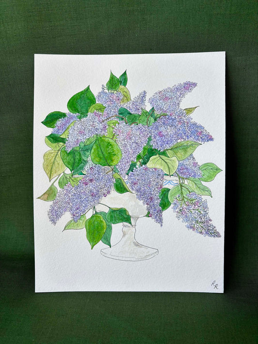 A botanical art print depicting a bouquet of purple lilacs and green leaves in a white vase.