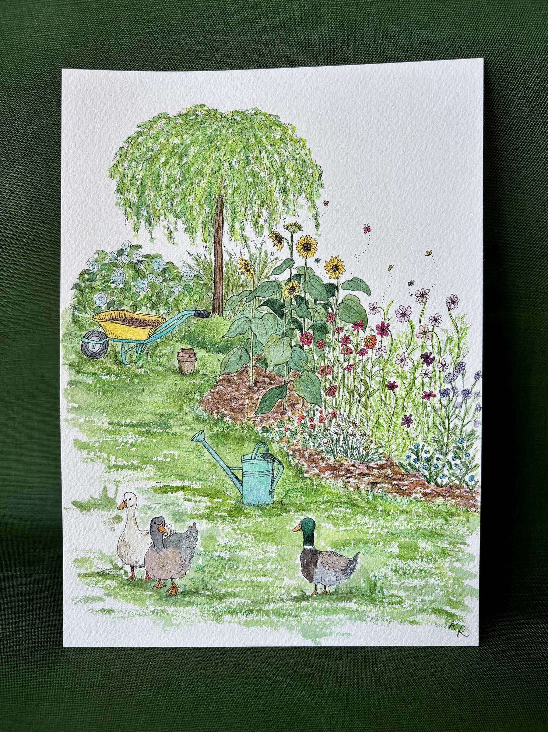 A watercolor garden illustration featuring a weeping tree, sunflowers, a wheelbarrow, a watering can, and three ducks.